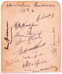 1934 Australian team, autograph page with 11 signatures including Bill Woodful, Len Darling, Hans Ebeling, Stan McCabe, Fleetwood Smith, plus Don Bradman added later in texta.