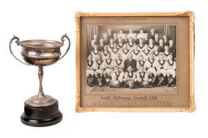 SOUTH MELBOURNE: 1935 team photograph "South Melbourne Football Club, v Collingwood at Sydney and Brisbane, 1935"; plus framed photograph of Roy McEachen; and 1928 Cycling trophy won by Roy McEachen.