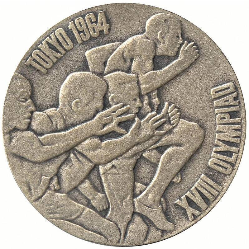 OLYMPIC MEDALS: 1964 Tokyo commemorative medal; 1968 Mexico silver