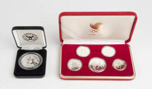 1988 Seoul Olympics Korean silver coin set in presentation case; plus Papua New Guinea 1991 South Pacific Games 10K coin in case.